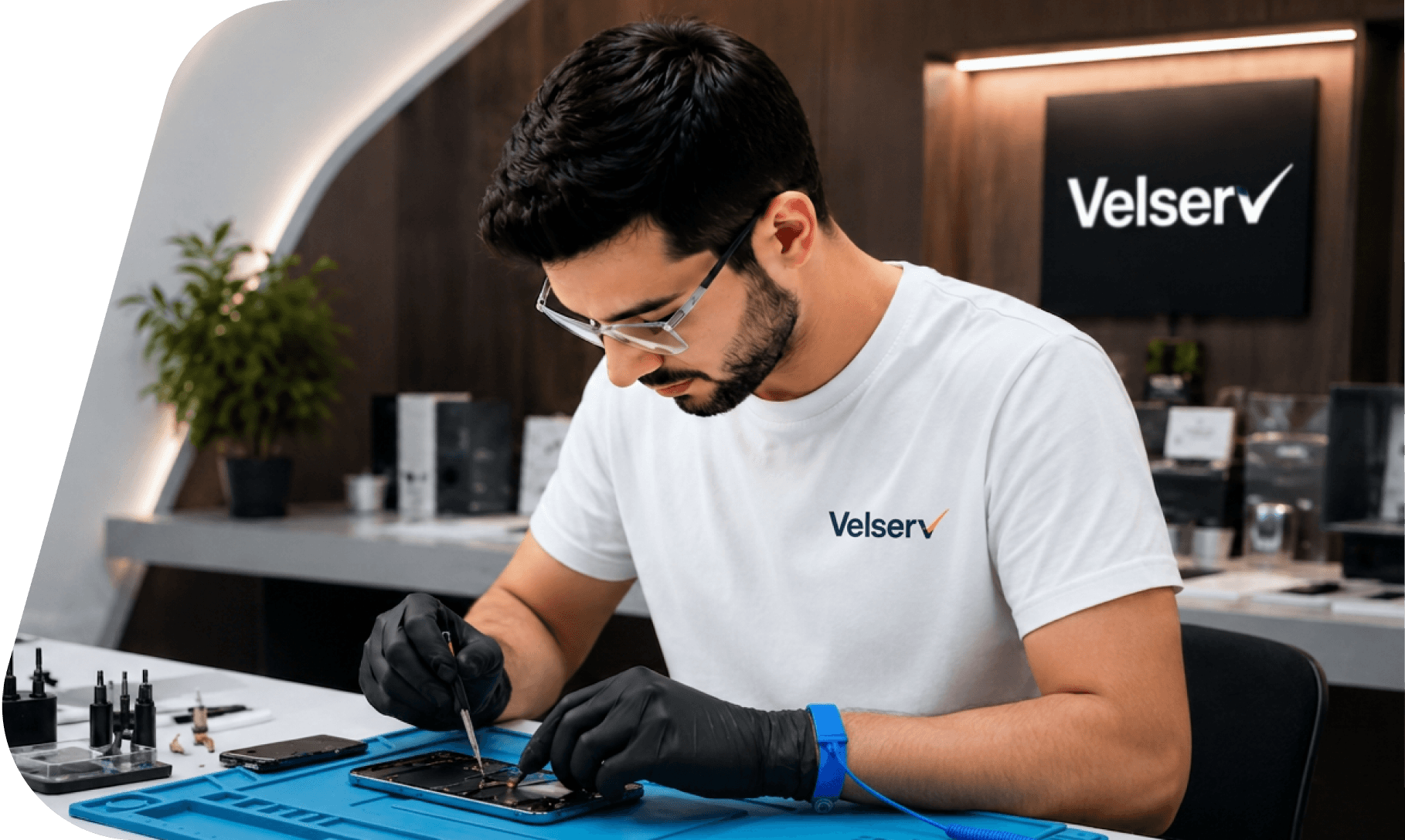 Velserv technician repairing a device